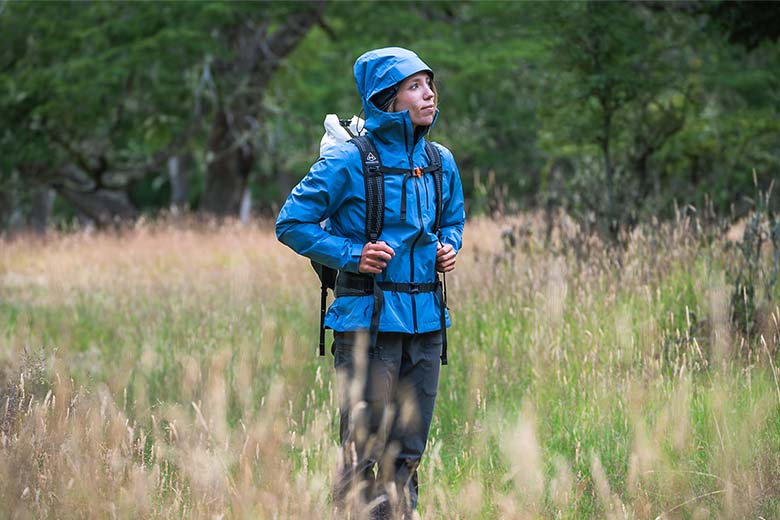 Outdoor Research Aspire II rain jacket (standing in field)